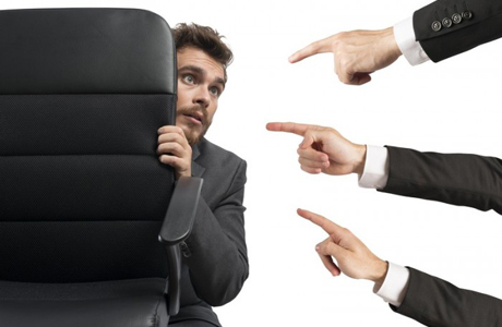 Fingers blaming a solicitor for negligence